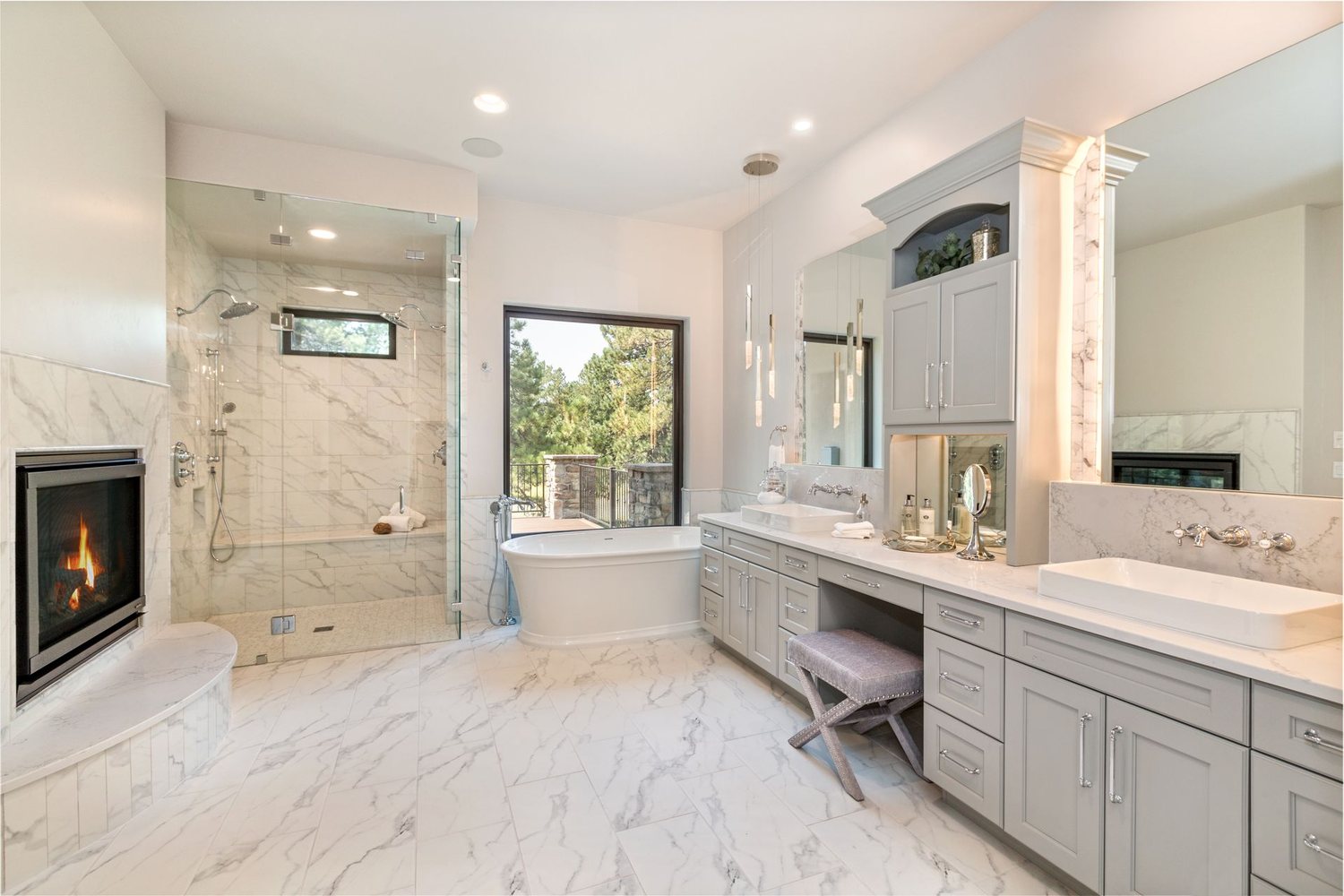 Fox Chase Bathroom by Plush Designs, with tiled walls, a glass shower and a light vanity
