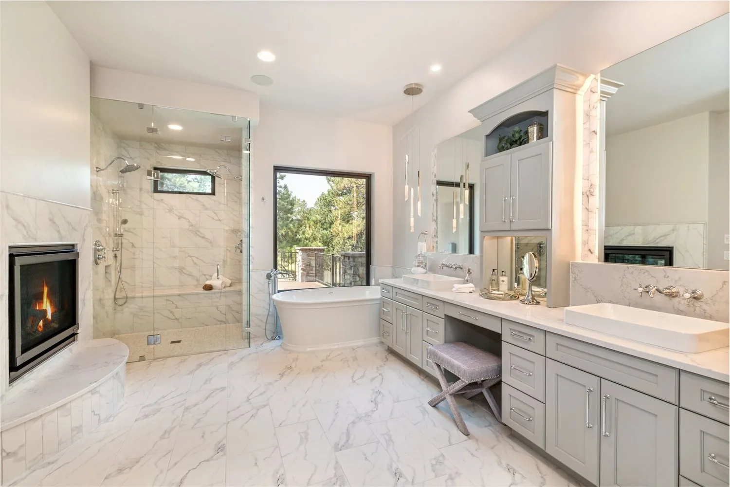 Fox Chase Bathroom by Plush Designs, with tiled walls, a glass shower and a light vanity